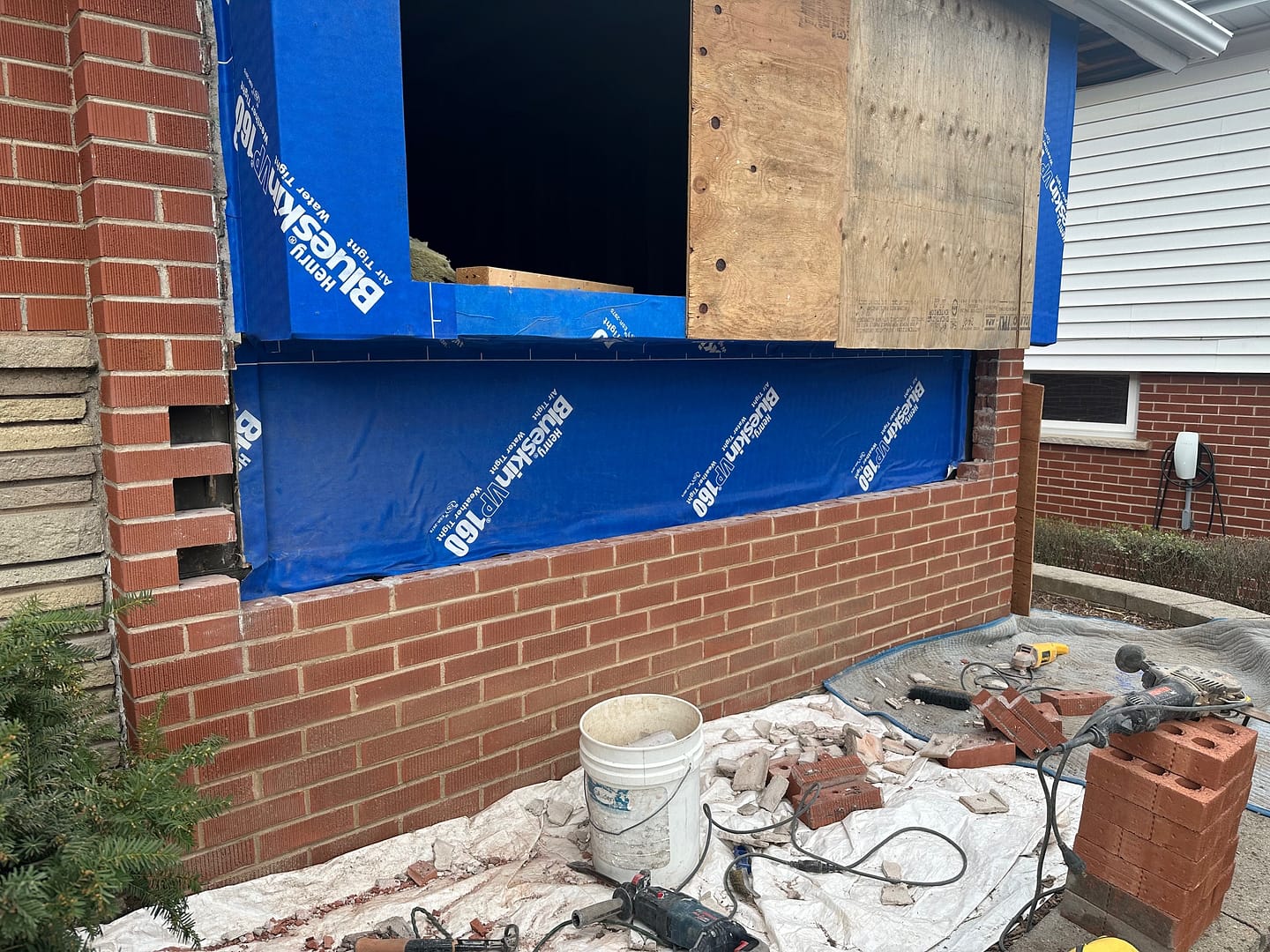 Brick Repair Below A Bay Window