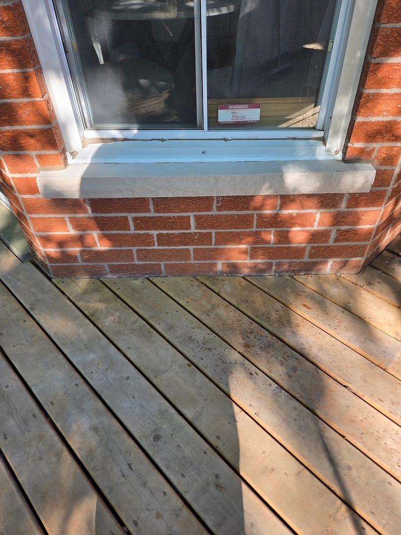New limestone installed beneath a window